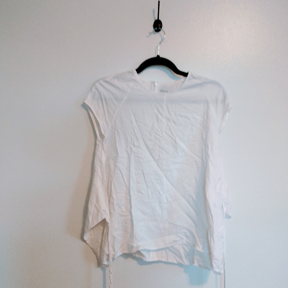White top with tie for the waist. Babaton size small
